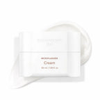 White cosmetic container with 'MICROFLUIDIZER Cream' text on a white background