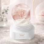 Jar of cream with a rose gold lid on a light background