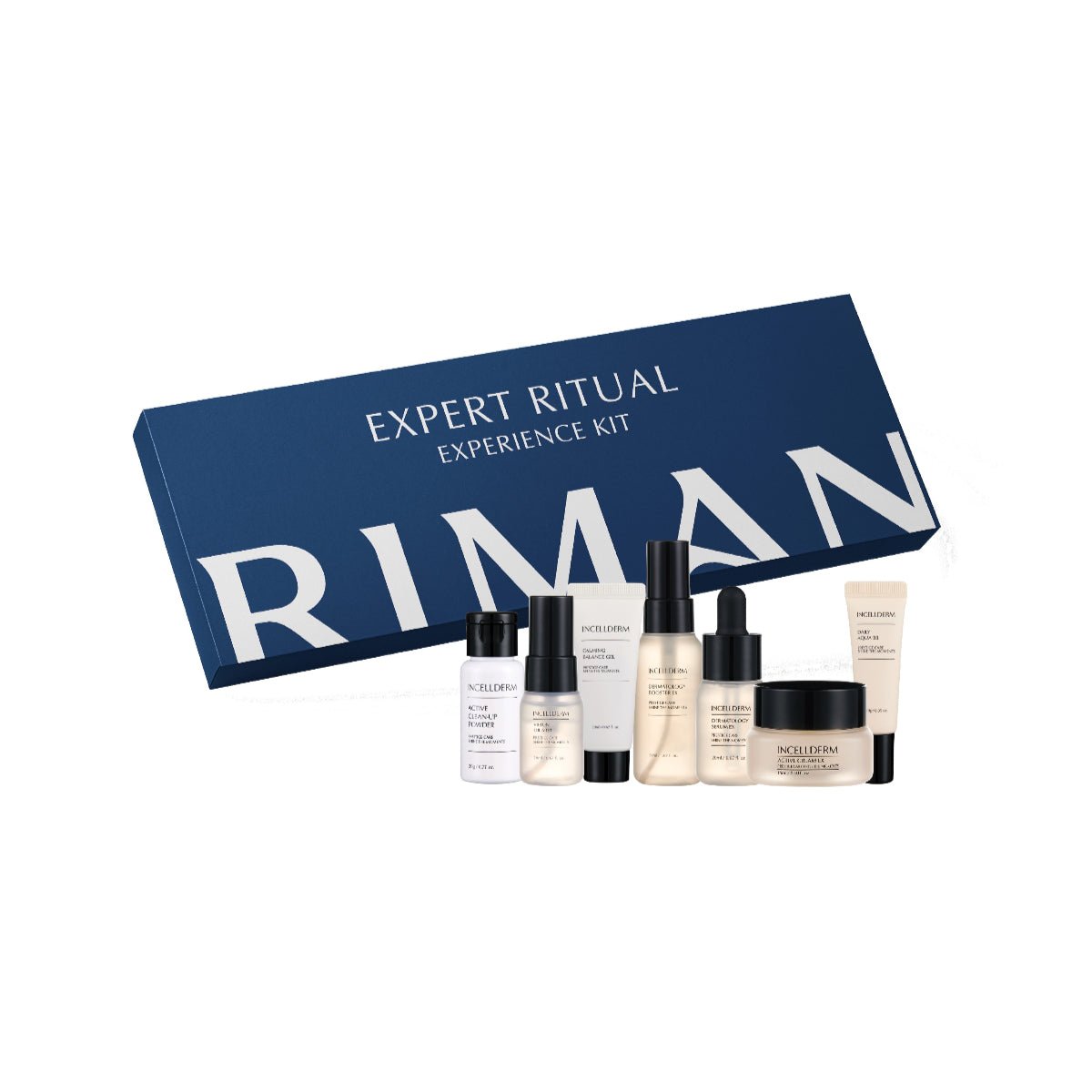 Riman Expert Ritual Experience Kit featuring a navy blue gift box with white lettering and five skincare bottles and jars arranged in front on a white background.